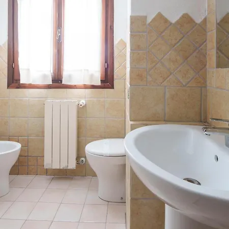 Acqua E Tramonto Ольбия